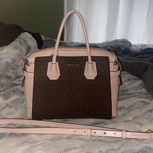 Authentic Michael Kors purse, used a few times but looks brand new.